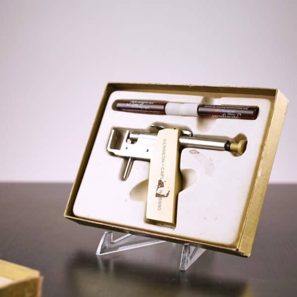PISTOLA FORA LOBI, PIERCING